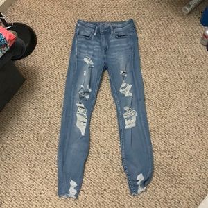 American Eagle ripped blue skinny jeans